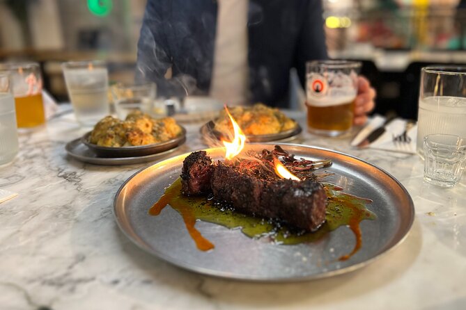 Camden Market Food Tour of 7 Tastings, Gin, Street Food & More - Cyberdog and Amy Winehouse give the walk a Camden identity
