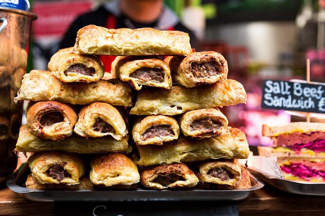 Devour London: Borough Market & Leadenhall Food Tour with Wine - Borough Market’s sausage rolls and modern sweets