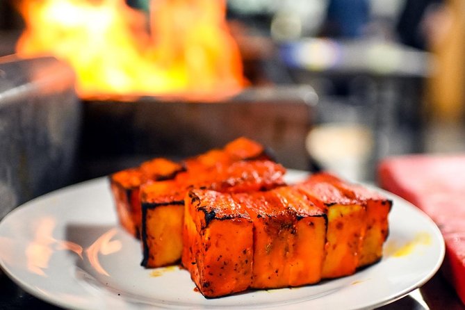 East London Indian Private Food Tour with 8+ Food Tastings - Snacks, chickpeas, and lassi