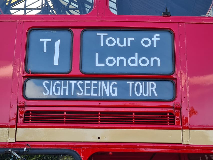 London: Guided Sightseeing Tour on a Vintage Open-Top Bus - The upper deck, weather, and photographs