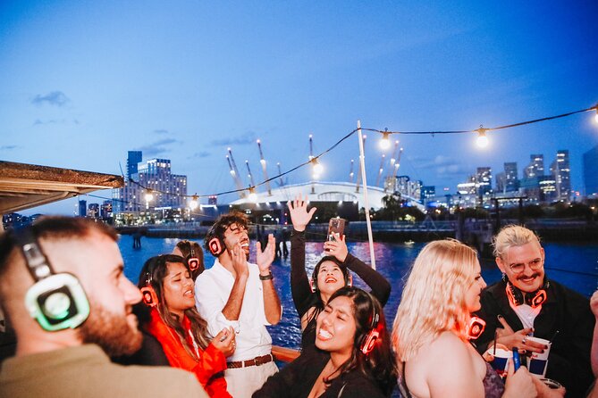 Silent Disco London Thames Boat Party - HMS Belfast and the Thames at night