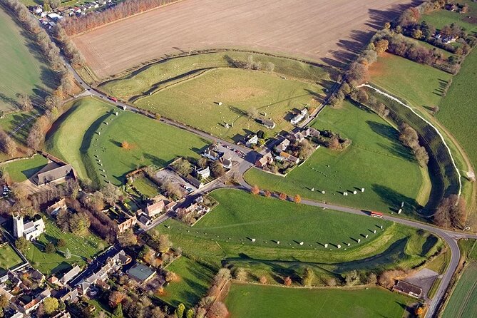 Stonehenge and The Stone Circles of Avebury Day Trip from London - Avebury: stones, sheep, and a village inside the circle